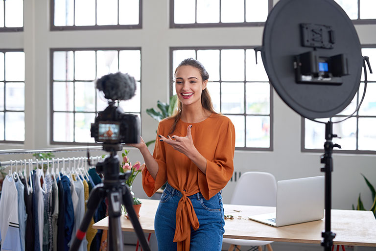 Influencer shooting a video with a teleprompter